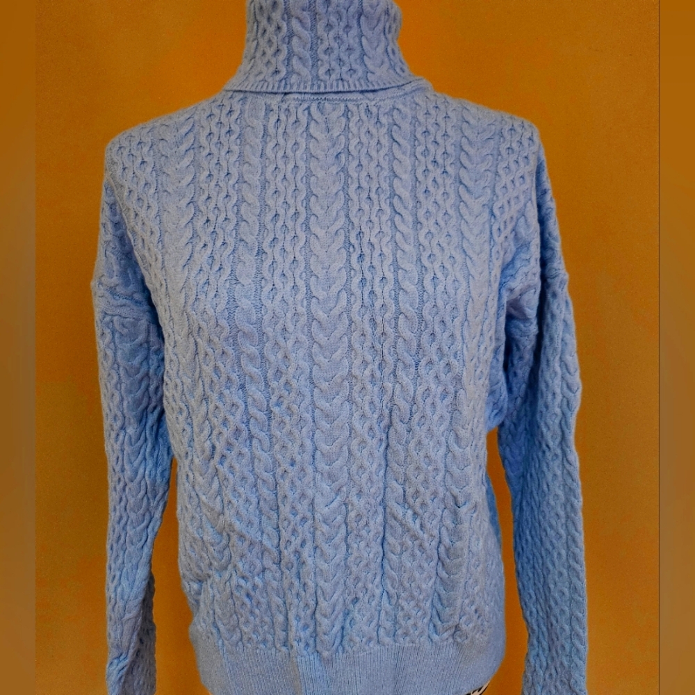 Blue cabled sweater